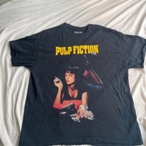 Pulp fiction T-shirt - Pulp fiction T-shirt bought at urban outfitters good condition. For all pulp fiction lovers.