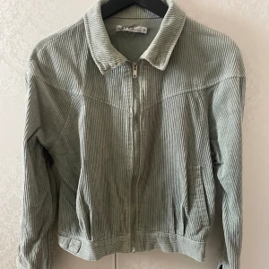 Manchester jacka  - Manchester jacka i färgen grå/blå/grön 