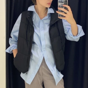 Puffer vest  - Really nice puffer vest can be worn during autumn and early spring! You can find a lot of ways to style it, and you can regulate how tight it is 