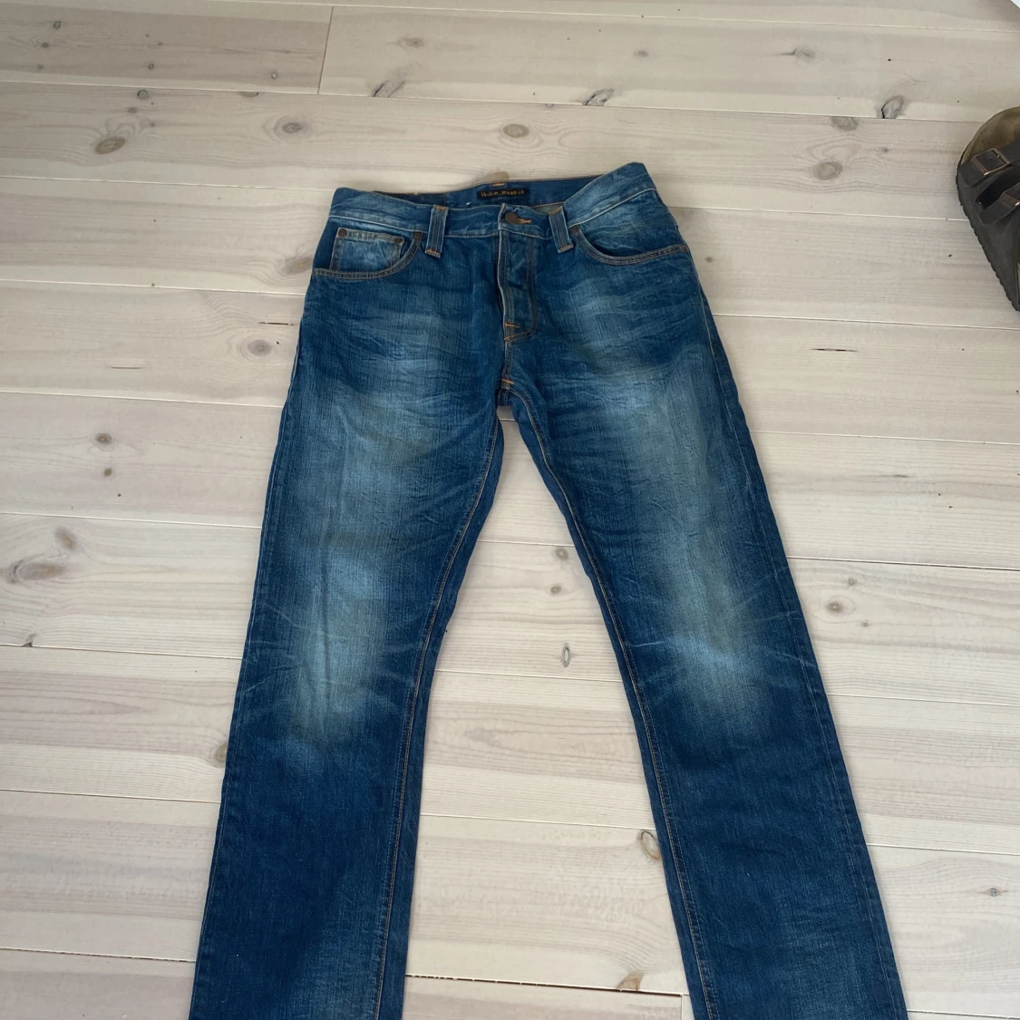 Blåa nudie jeans - 90