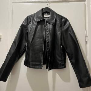 Leather jacket in the softest faux leather. Really nice silver detailing in the zippers. Fits anyone from size 32-38. Never used!