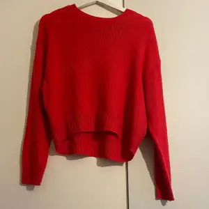 Röd stickad tröja 