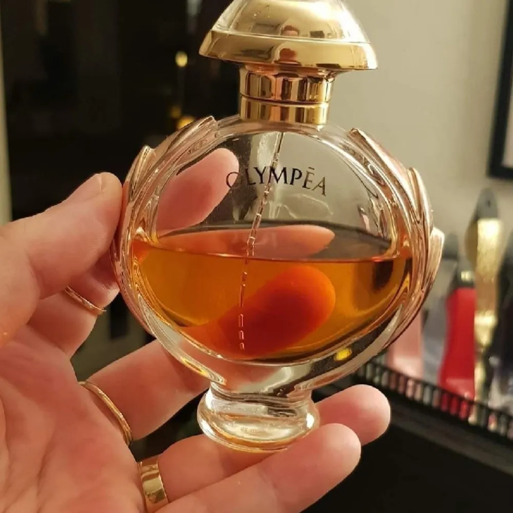 Paco Rabanne Olympea 50ml ca hälften kvar se på bild.  . Övrigt.