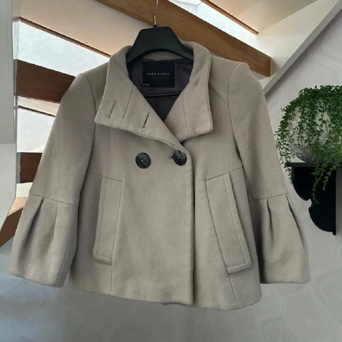 Trekvartsärmad kappa