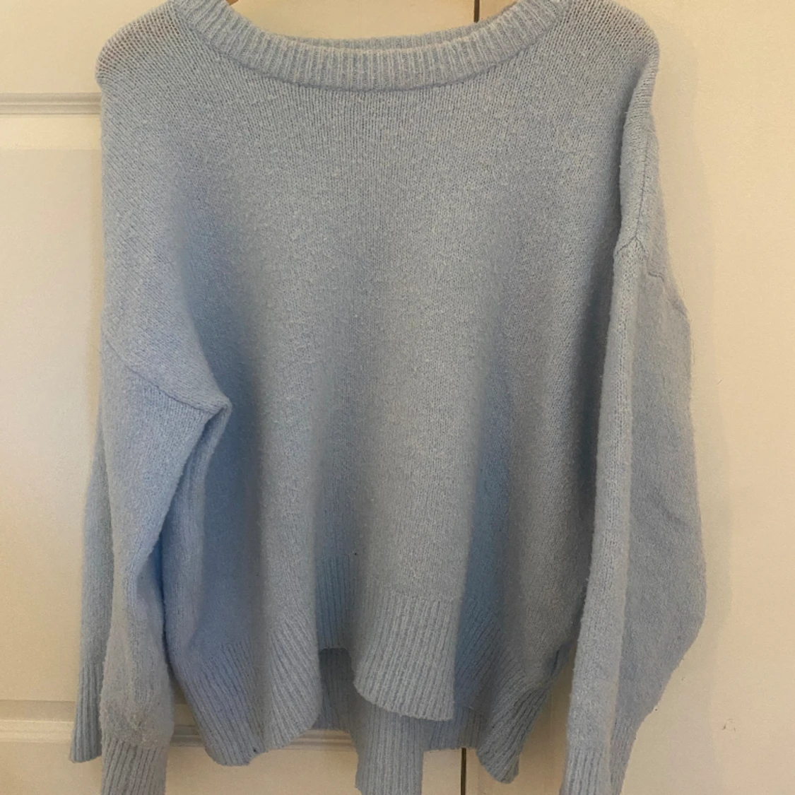 ljusblå stickad tröja  - 91
