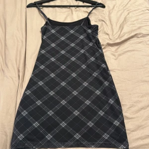Short black/blue Plaid dress - The dress is fairly used but in good condition 
