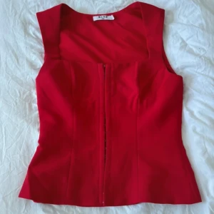 Korsett topp - Korsett topp från Nakd i storlek 34 