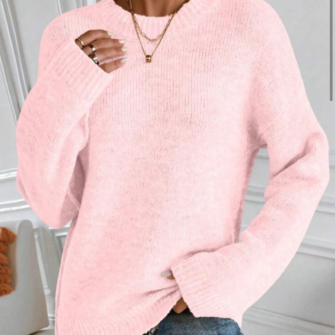 Ljusrosa stickad tröja 