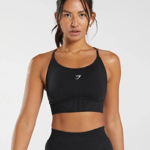 Sport-bh  - Säljer denna jättesköna och snygga sport-bh/toppen från märket Gymshark. Den är helt oanvänd och lappen är kvar!