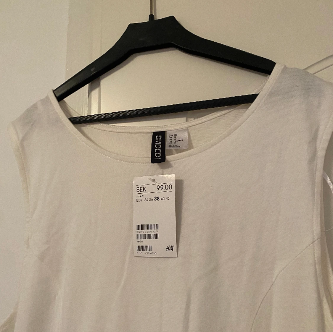 Vit klänning från H&M - 90