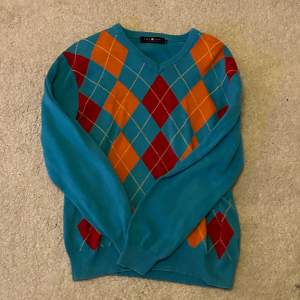 En Blå Park lane tröja med rutigt mönster, använd men i bra skick