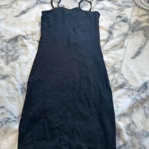 Tajt klänning - Supersnygg tajt lite kortare klänning