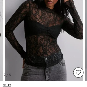 Spets topp  - Spets topp från Nelly, nypris 399, inte min stil därav inte använd mer än test. 