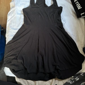 Svart tunika - *Sparsamt använd *Strl: M (normal) 