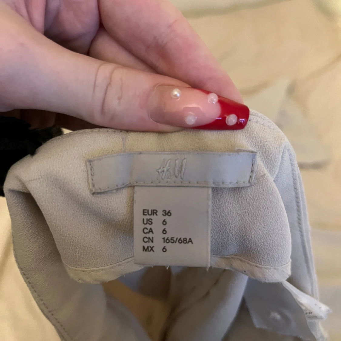 Crémefärgade kostymbyxor - 91