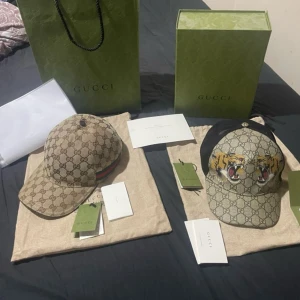 Gucci keps  - Jag har tröttnat på Gucci eftersom alla har dom   En för 1000kr  2 för 1500kr