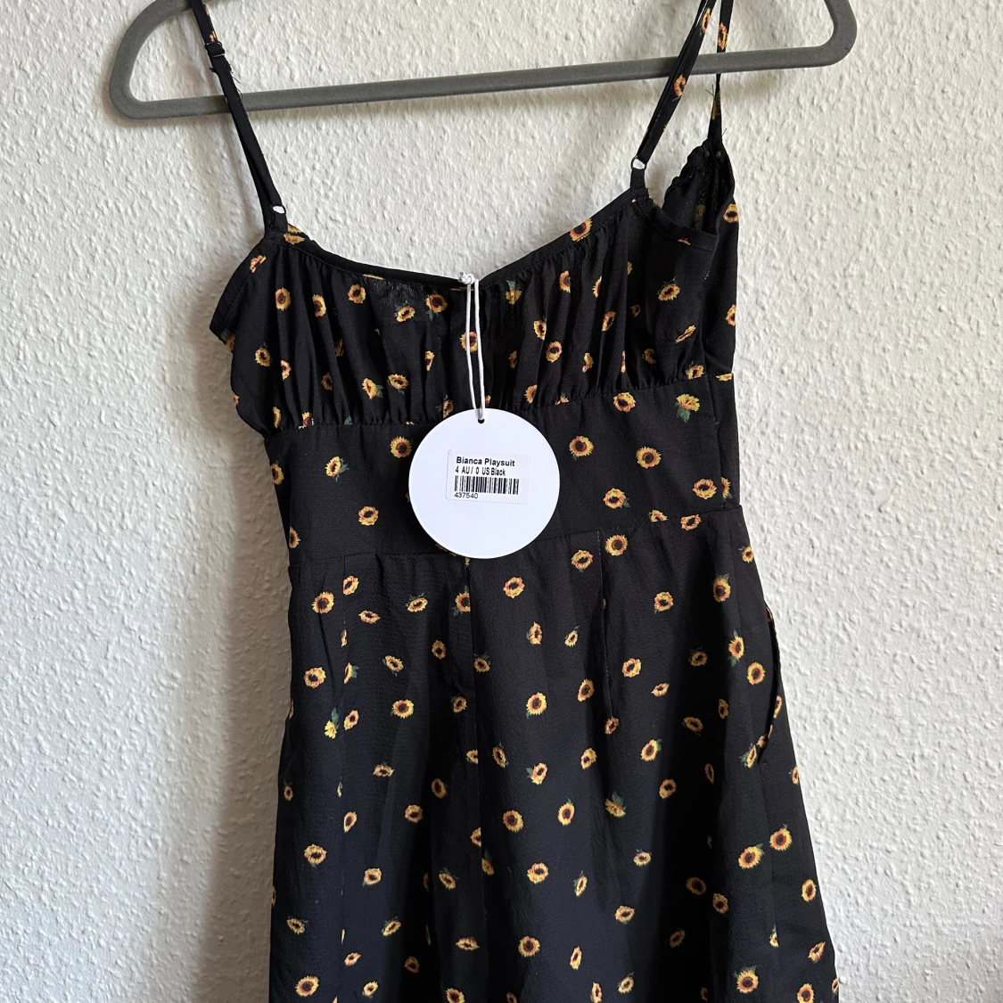 Jumpsuit med solrosor - 92