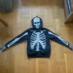 Skeleton hoodie with full zip and face print