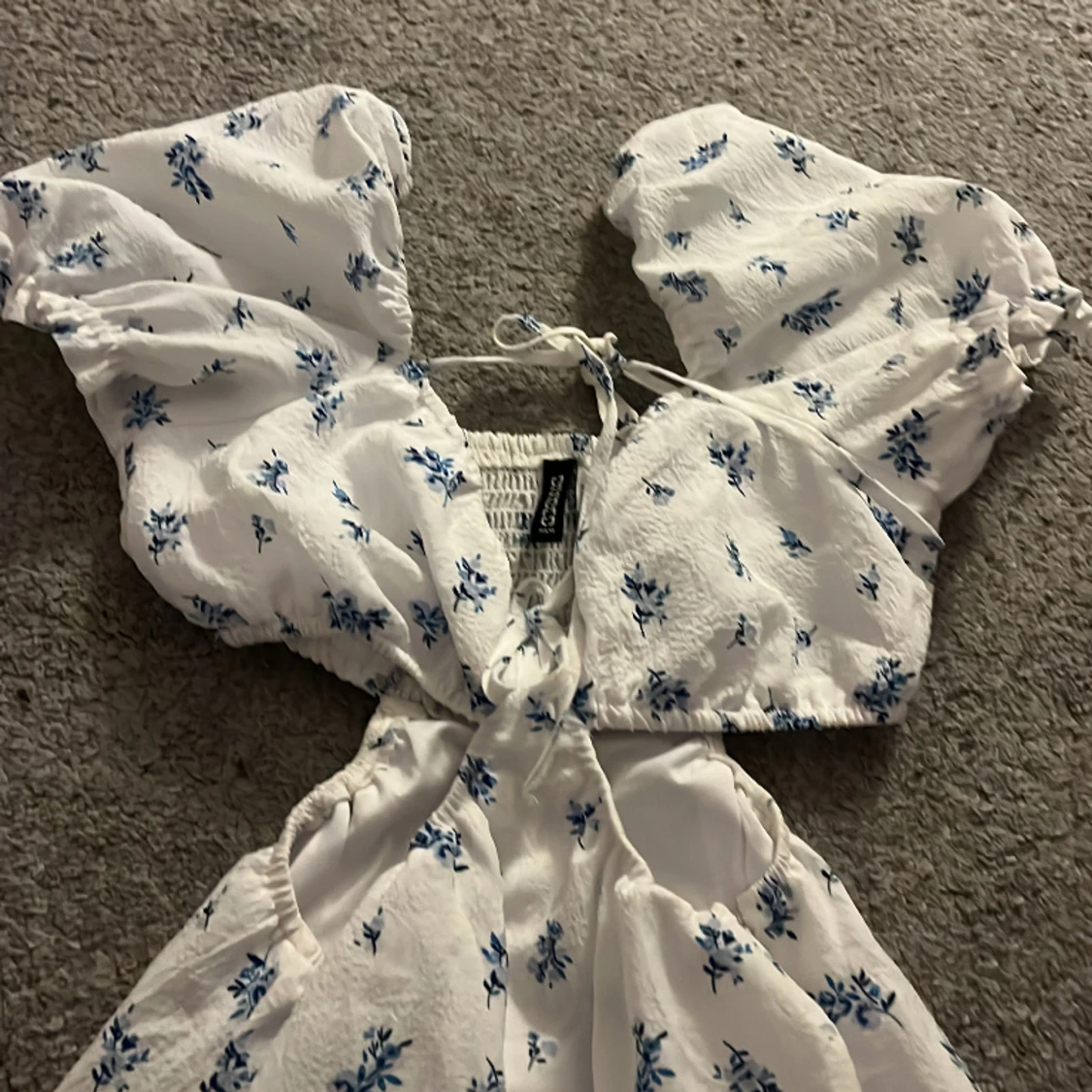 Blåblommigkläning i xs - 90