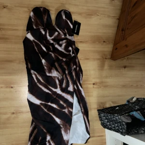 Klänning  - Storlek 38