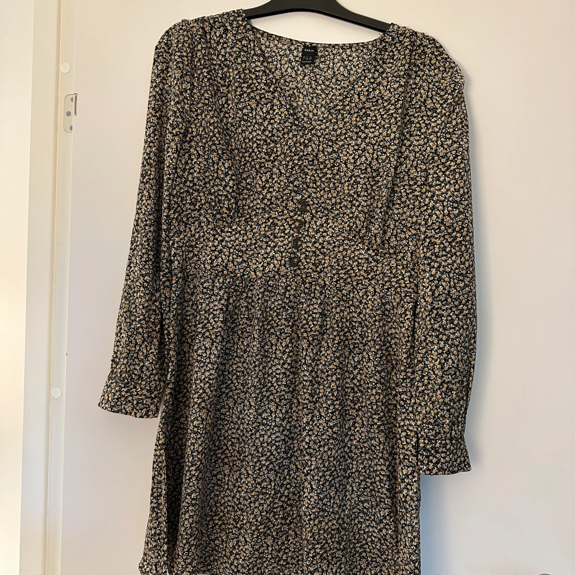 Grönblommig klänning - 91