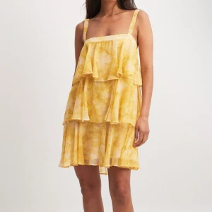 Nakd klänning - Skitsnygg, endast använd en gång från NA-KD i stl 42