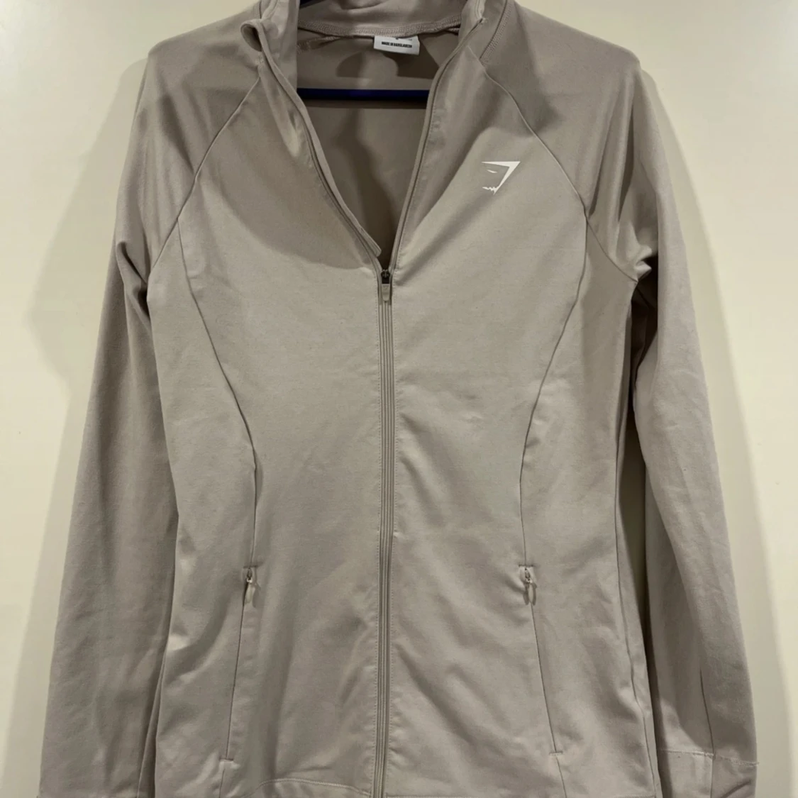 Gymshark verkkatakki beige