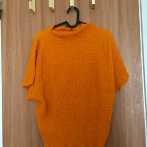 Orange tröja