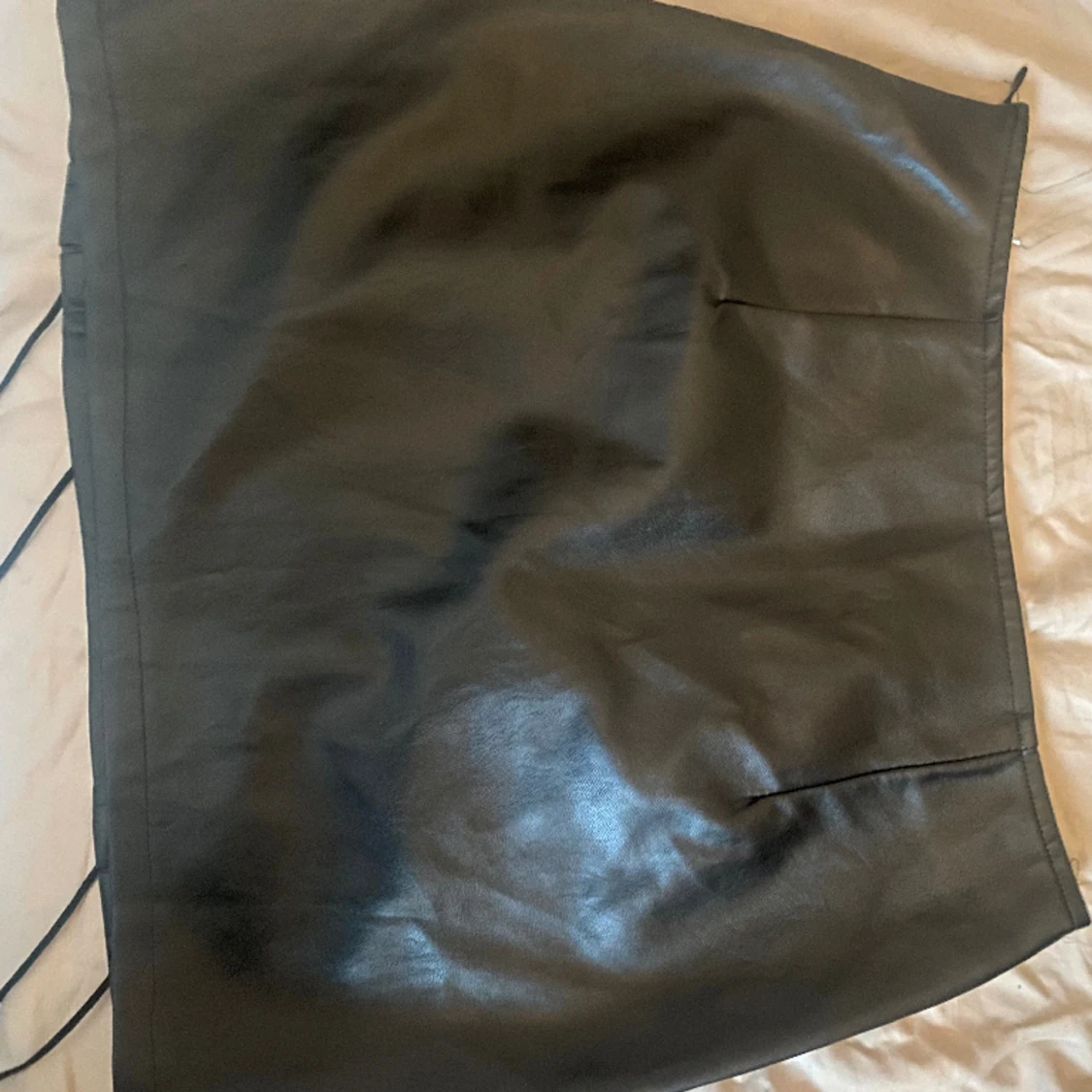 Svart skinnkjol - 90