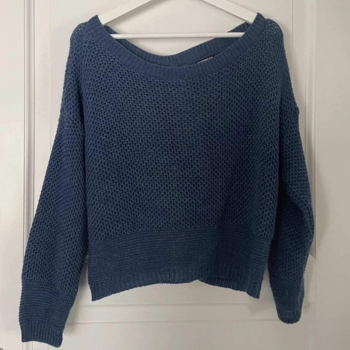 Blå stickad tröja