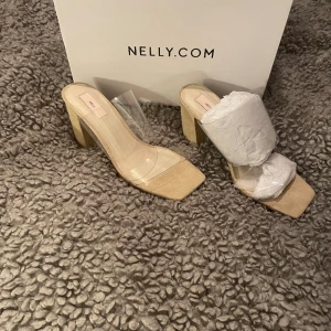 Klackar  - Oanvända klackar från Nelly, storlek 37 