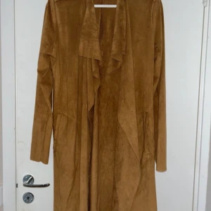 Brun kappa - Köpt för ett tag sen och använd några gånger, men i fint skick.