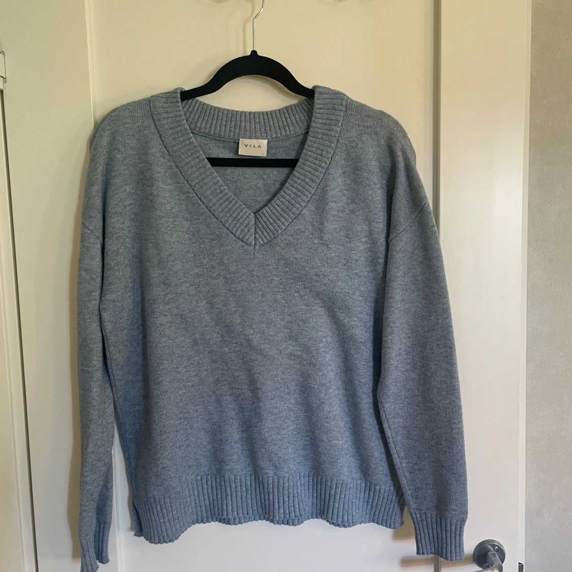 Ljusblå stickad tröja från Vila