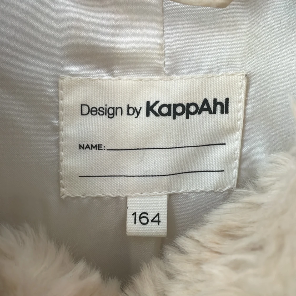 Beige pälsjacka från KappAhl - 91