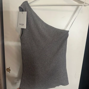 Fest topp  - Knappt använd topp 