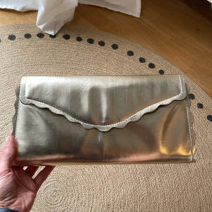 Gold purse  - 16*30 Gold Good condition 