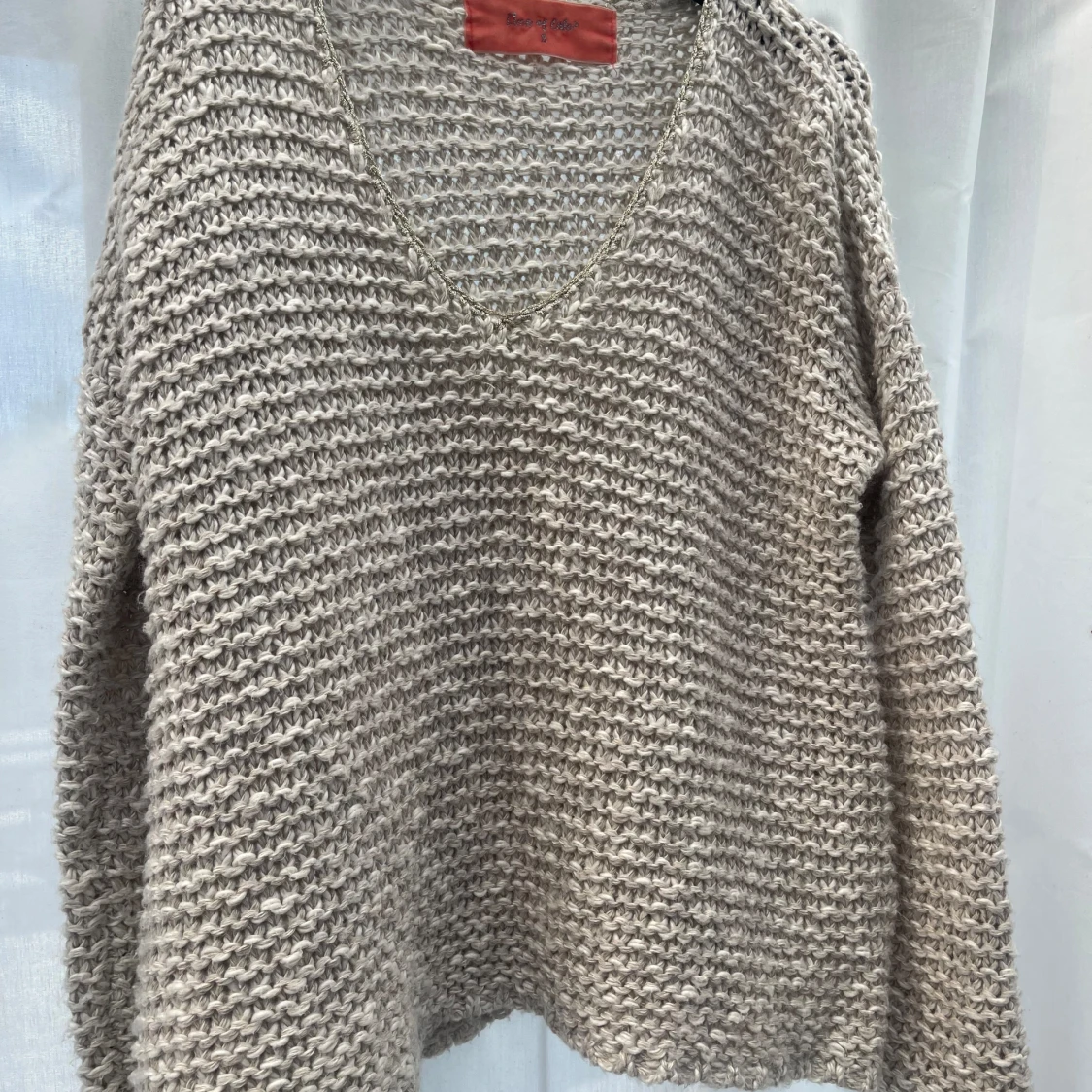 Beige stickad tröja