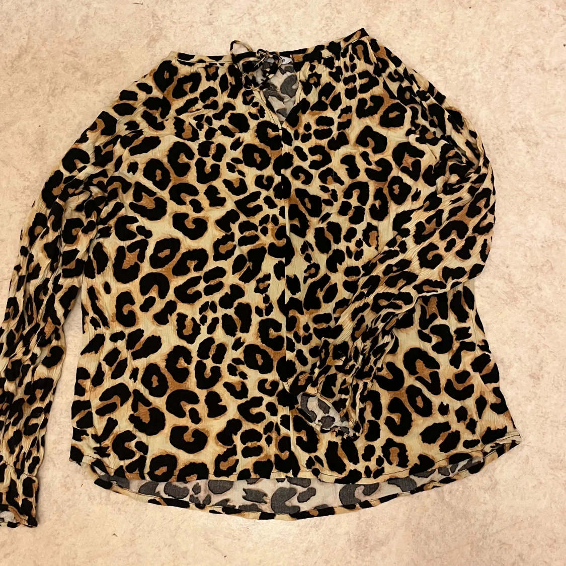 Leopard blus