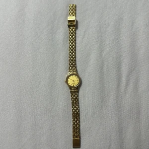 Timeless klocka  - En guldklocka från Citizien Quartz  Bra skick 