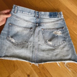 Jeans kjol - Jeanskjol i strl 38/m