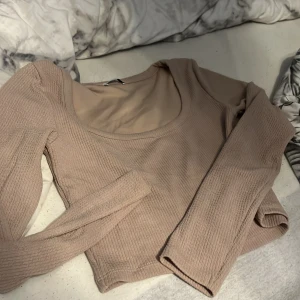 Långärmad topp  - Aldrig använd