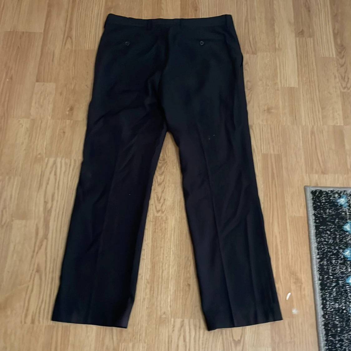 Svarta kostymbyxor  - 90