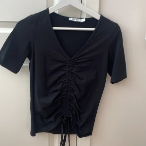 Topp  - Topp från NA-KD, aldrig använt 