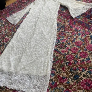 Klänning  - Oanvänd.