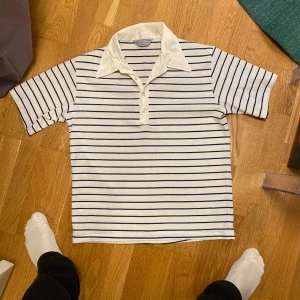 Polyester/silkes piké  - Storlek L, 