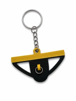 Jockstrap nyckelring  - Ge dina nycklar lite mer personlighet med denna unika jockstrap-insperade nyckelring! Perfekt för dig som gillar en lekfull design, Pride, läder- och fetishkultir eller bara vill ha en rolig och annorlunda accessoar.