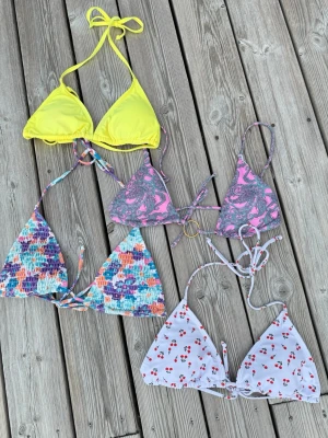 4-p bikinitoppar - 4st bikinitoppar i olika färger och mönster. Mellan storlekarna M-L. Lite små i storlekarna, så passar även S. Knappt använda. Perfekta till utlandssemestern.