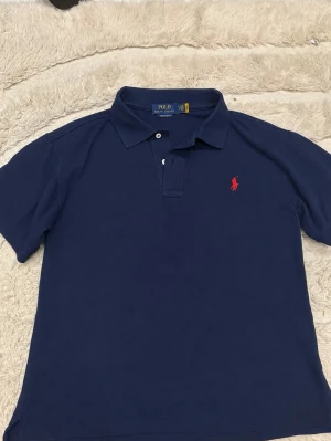 Ralph Lauren pike  - Snygg navyblue Ralph lauren piké size M