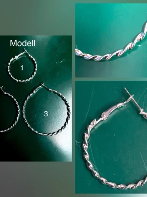 Prisförslag- 1 par valfria Silvriga tvistade hoops örhängen - Snygga silvriga hoops örhängen med tvistad design. De är runda och har en snygg, glansig finish som ger en modern touch till din look. Perfekta för dig som gillar stilrena accessoarer med det lilla extra. Välj ett par av 3 olika modeller 
