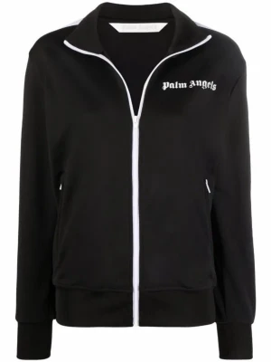 Svart zip hoodie från Palm Angels - Säljer en svart hoodie från Palm Angels med vit dragkedja och vit logga på bröstet. Hoodien har ribbade muddar, hög krage och två fickor framtill. Perfekt för en avslappnad och trendig stil.